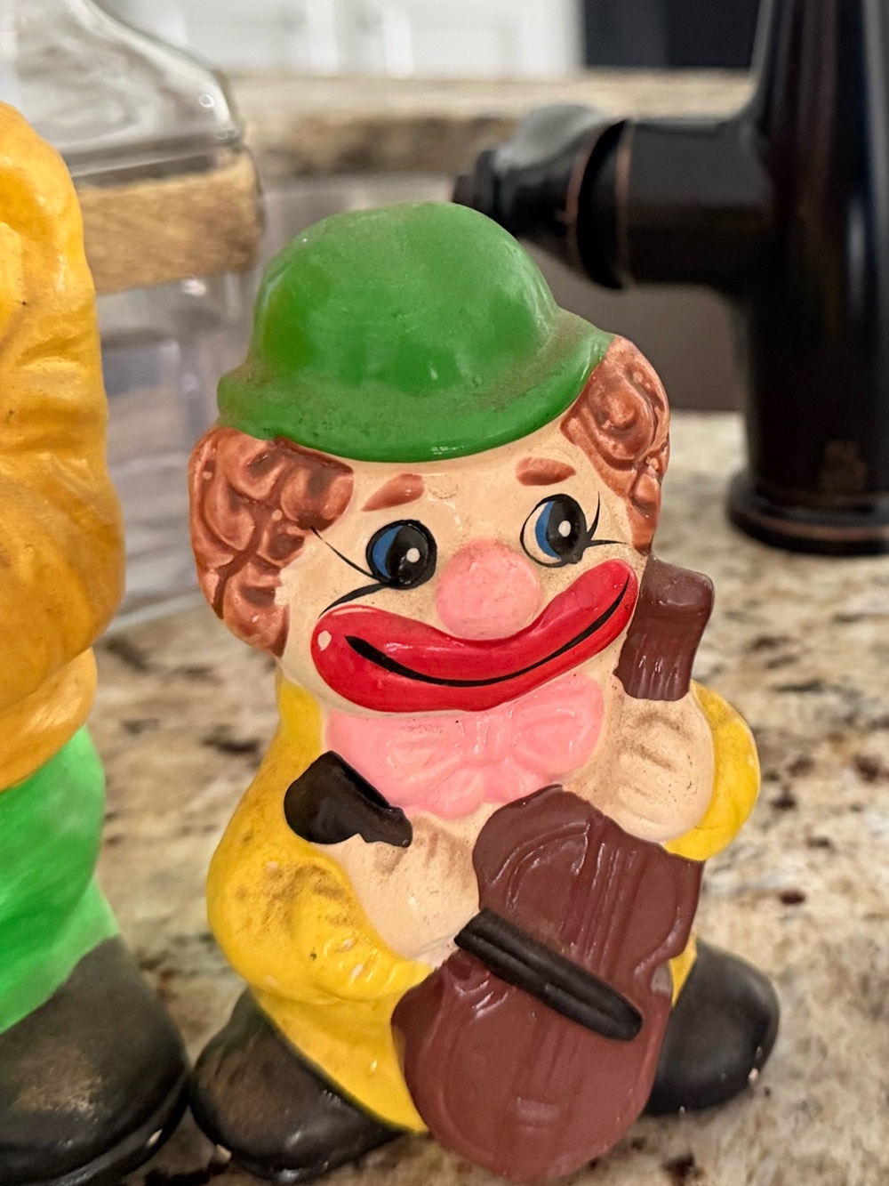 Green-Hat Yellow Ceramic Clown Figurine Bank with Instrument - Decorative Accent